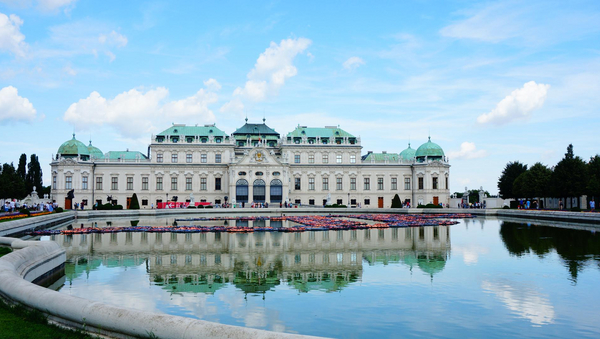 A palace and its reflection in a big pond.
