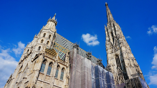 St. Stephen's Cathedral in Vienna in front of blue sky.